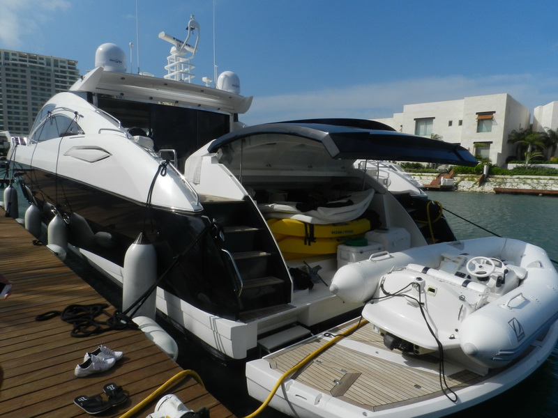 Sunseeker Predator 82 ft interior main salon with premium furnishings for VIP events and film productions Cancun