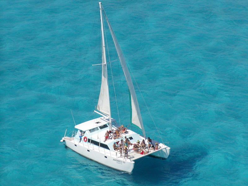 Rent a Catamaran for group private sailing tour Isla Mujeres…