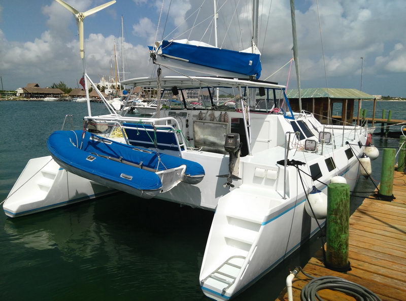 Rent a private Catamaran for sailing tour to Isla Mujeres, g…
