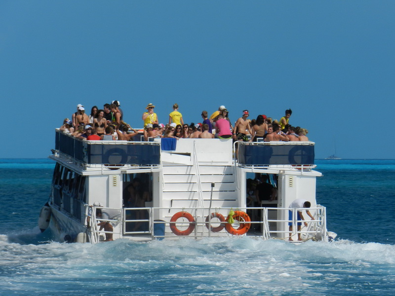 Cancun Booze cruise pary hangover hungup  boat Catamaran ren…