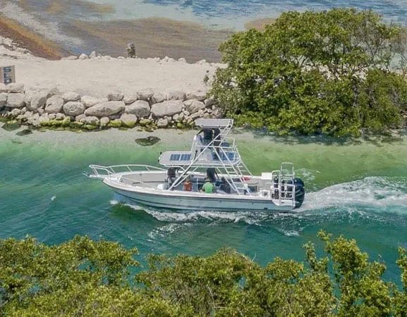Piratas TOO 33 ft boat docked at Puerto Aventuras marina — snorkel and party charter Riviera Maya
