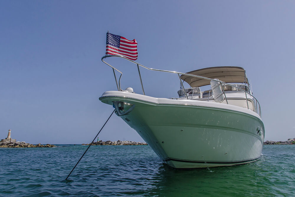 Cool cabin interior of the SeaRay 51 with seating and AC