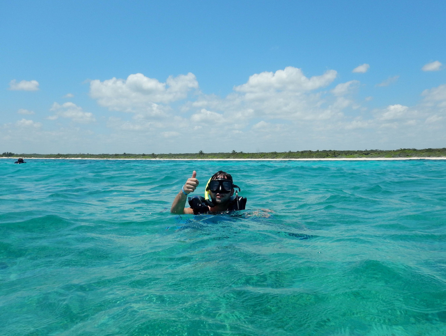 4 Piratas yacht profile in the turquoise Riviera Maya sea